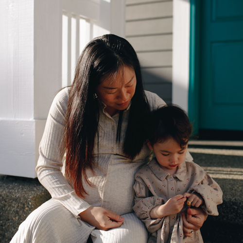 mother and child on steps