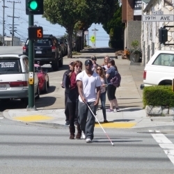 Students in the mobility program crossing street
