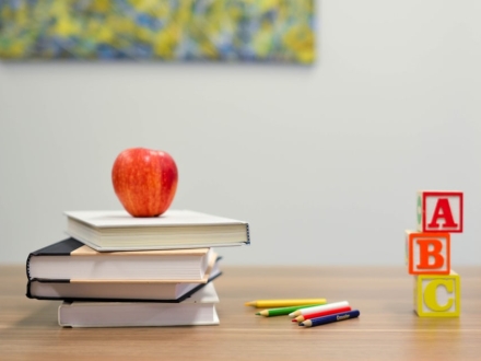 Student desk with books and writing material